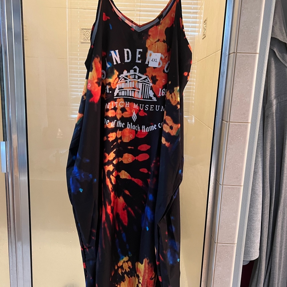 Maxi dress , orange and black w Sanderson sisters printed on front never worn